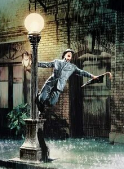 кадр из фильма Танцующий под дождём